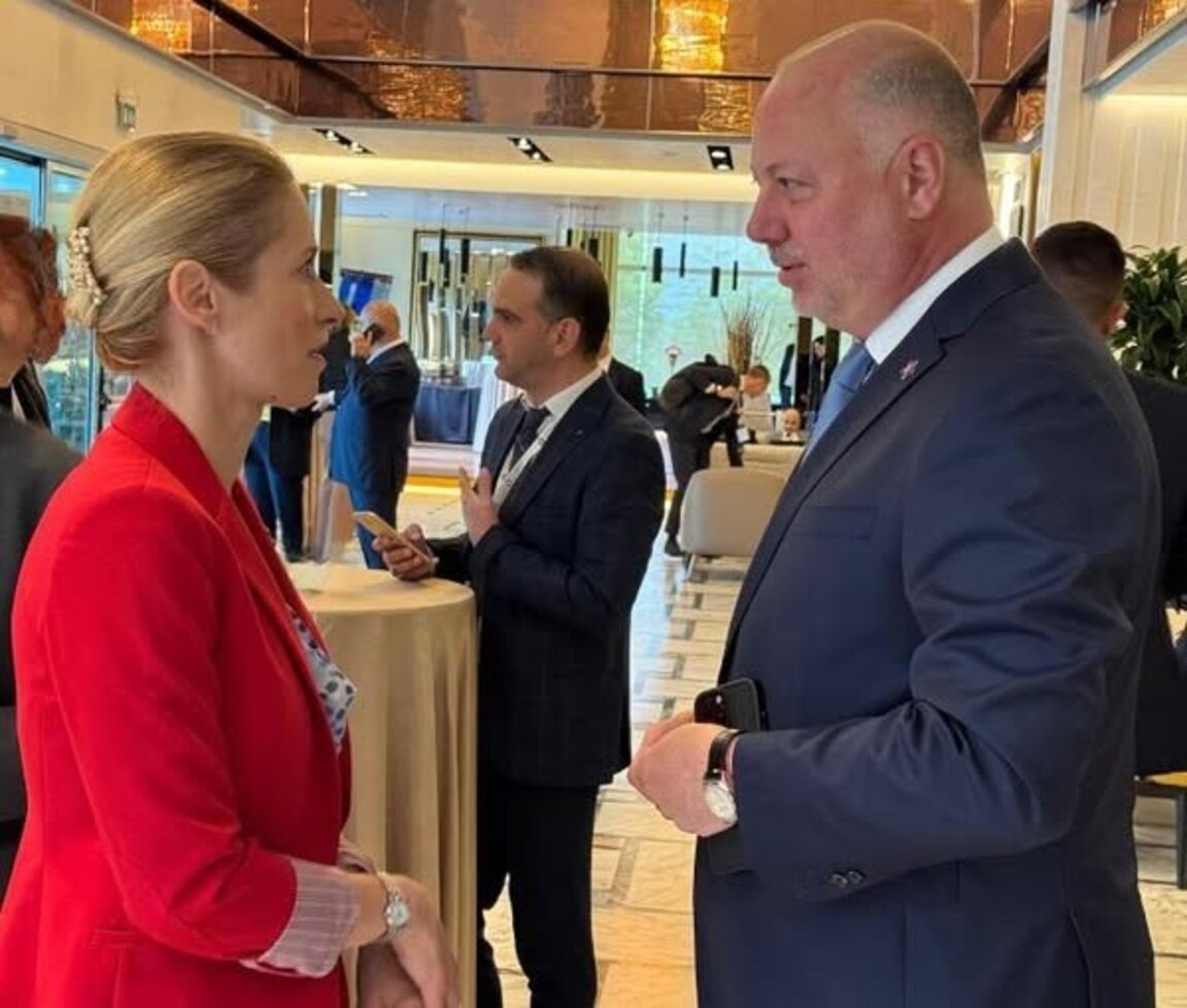 Кая Калас и Росен Желязков